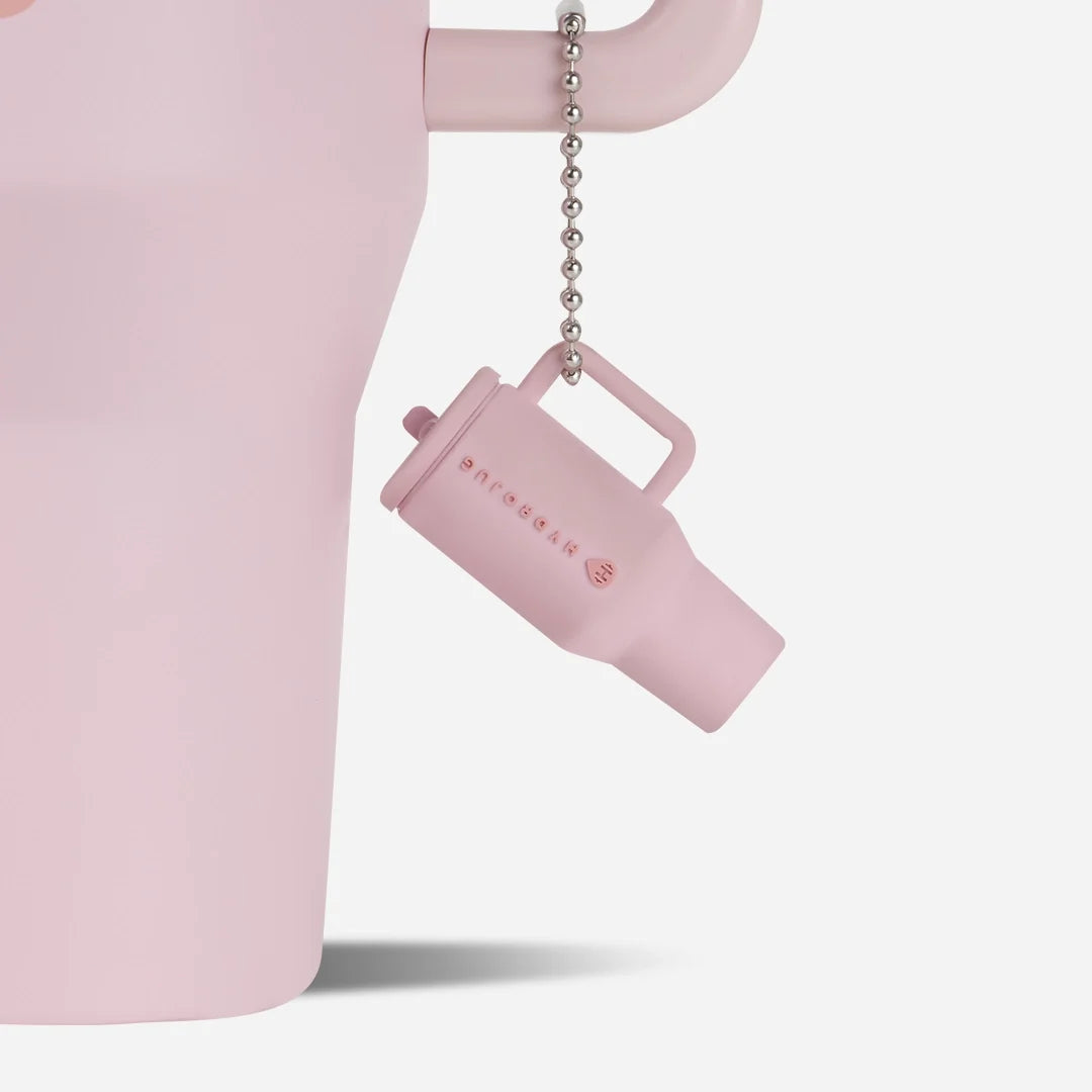 traveler-keychain-v6 Web-TravelerKeychainPhotos-PinkSand2.webp